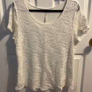 Lace top with tshirt lining. Creamy white